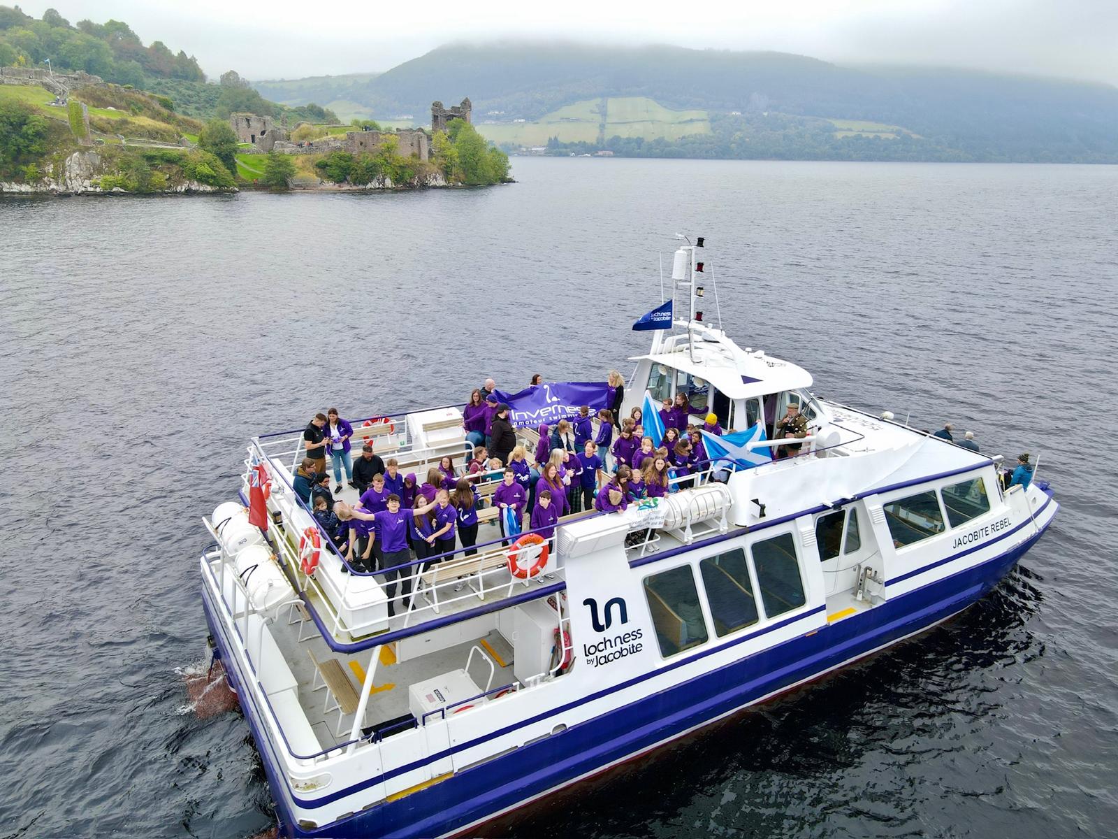 Inverness Swimming Club at Urquhart Castle on board Jacobite Loch Ness vessel 